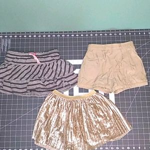 2 skirts and 1 shorts size 4 - cat & jack, uniqlo